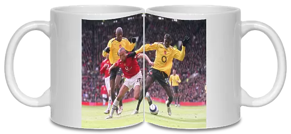 Emmanuel Adebayor and Abou Diaby (Arsenal) Mikael Silvestre (Man Utd)