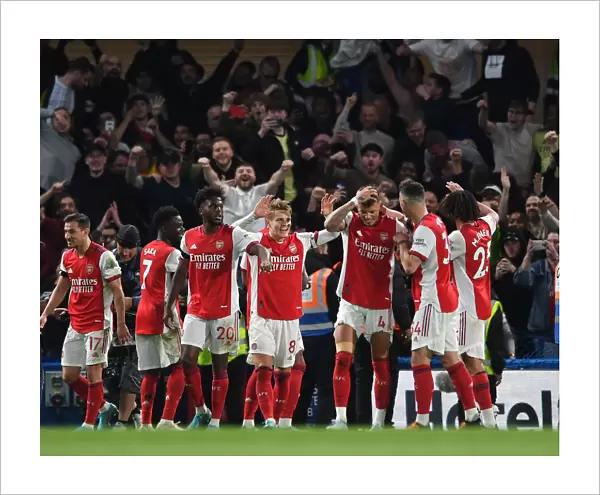 Martin Odegaard and Arsenal Team Celebrate Goals Against Chelsea in Premier League
