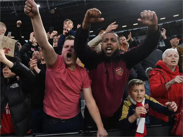 Arsenal Fans Celebrate Dramatic Win Against West Ham United in Premier League Showdown