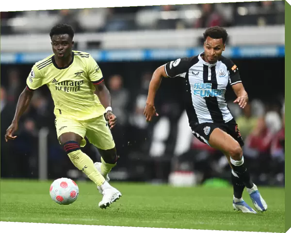 Bukayo Saka vs Jacob Murphy: Intense Battle at St. James Park - Arsenal vs Newcastle United, Premier League 2021-22