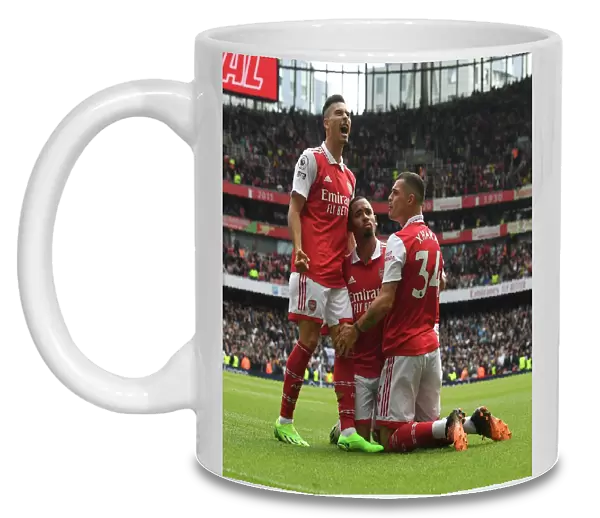 Arsenal's Gabriel Jesus, Martinelli, and Xhaka Celebrate Goals Against Tottenham in 2022-23 Premier League