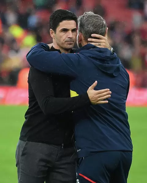Arsenal's Mikel Arteta Embraces Coach Amidst Premier League Tension: Arsenal FC vs. Nottingham Forest (2022-23)