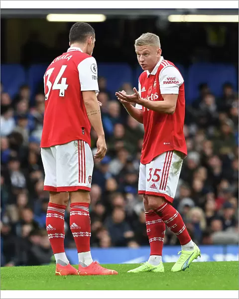 Arsenal's Xhaka and Zinchenko in Action Against Chelsea in the Premier League (2022-23)