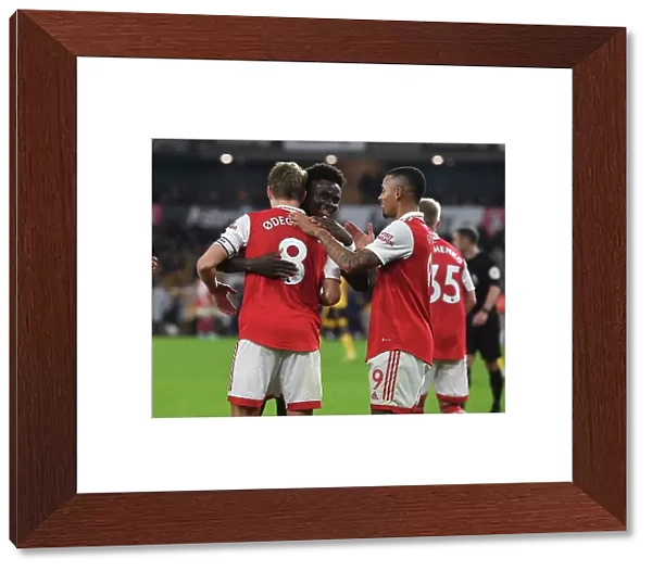 Martin Odegaard and Bukayo Saka Celebrate Arsenal's Goals Against Wolverhampton Wanderers in 2022-23 Premier League