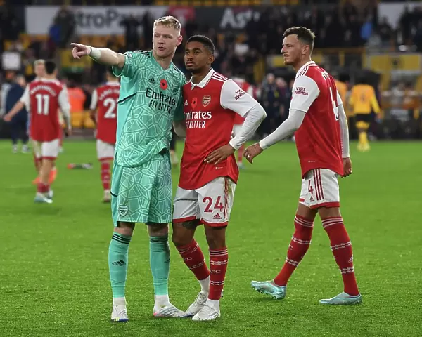 Arsenal's Reiss Nelson, Ben White, and Aaron Ramsdale Celebrate Victory over Wolverhampton Wanderers in 2022-23 Premier League