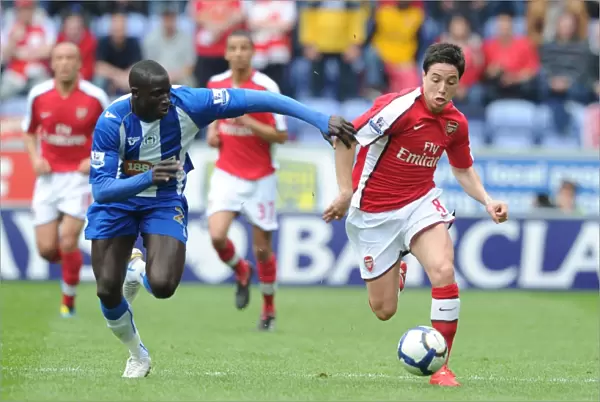 Samir Nasri (Arsenal) Mohamed Diame (Wigan). Wigan Athletic 3: 2 Arsenal