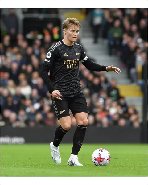 Martin Odegaard: Arsenal's Midfield Maestro Dazzles in Arsenal's Victory over Fulham, Premier League 2022-23