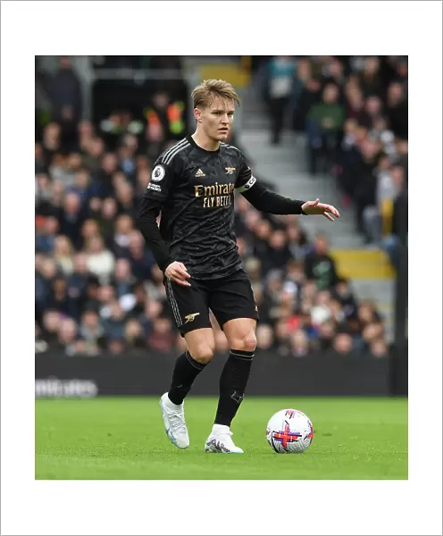 Martin Odegaard: Arsenal's Midfield Maestro Dazzles in Arsenal's Victory over Fulham, Premier League 2022-23