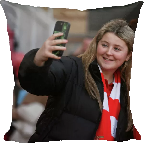 Arsenal Women Celebrate FA WSL Victory Over Tottenham Hotspur: Jodie Taylor Amidst Cheering Fans