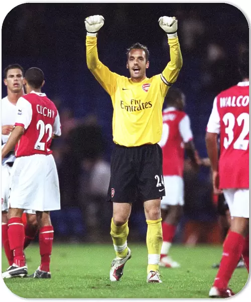 Manuel Almunia (Arsenal) celebrates in front of the Arsenal fans