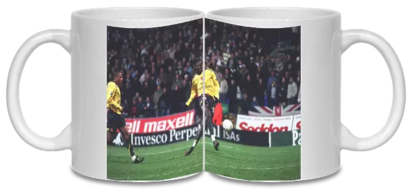 Emmanuel Adebayor shoots into an empty net to score the 3rd Arsenal goal