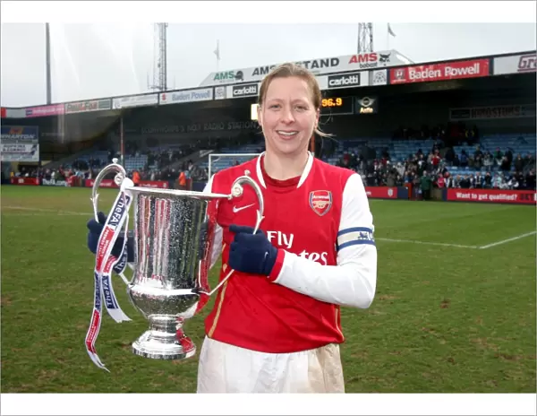 Jayne Ludlow (Arsenal) with the League Cup Trophy