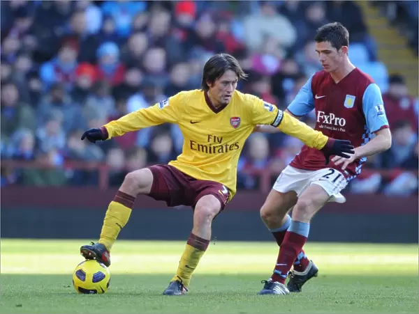 Tomas Rosicky (Arsenal) Ciaran Clark (Villa). Aston Villa 2: 4 Arsenal. Barclays Premier League