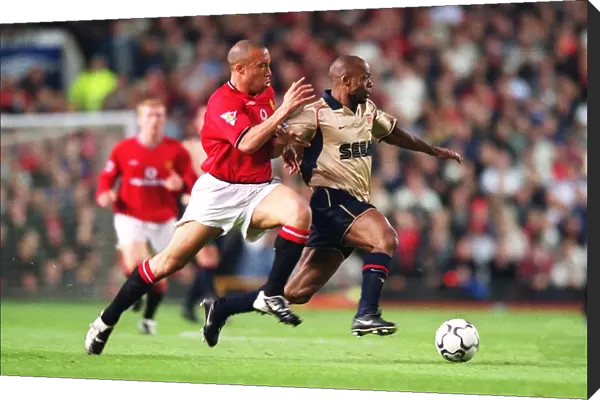 Sylvain Wiltord (Arsenal) Mikael Silvestre (Manchester United)