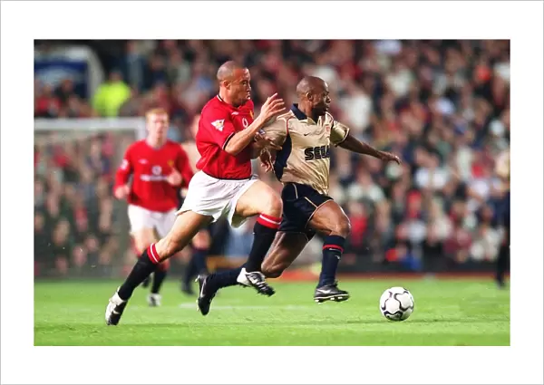 Sylvain Wiltord (Arsenal) Mikael Silvestre (Manchester United)