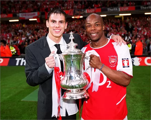 Jeremie Aliadiere and Sylvain Wiltord (Arsenal) with the FA Cup Trophy