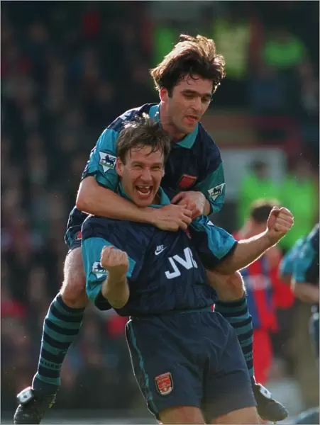 Paul Merson celebrates his goal for Arsenal with Eddie McGoldrick