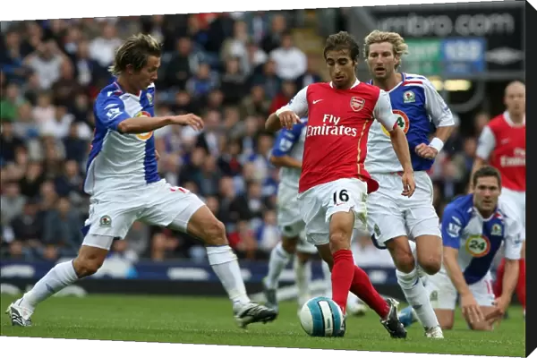 Mathieu Flamini (Arsenal) Morten Gamst Pedersen and Robbie Savage (Blackburn Rovers)