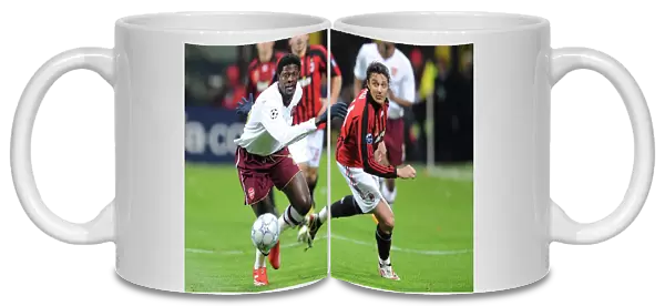 Emmanuel Adebayor (Arsenal) Massimo Oddo (AC Milan)
