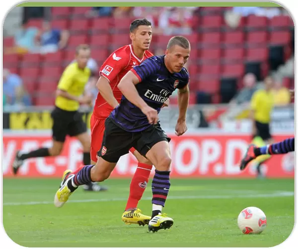 Lukas Podolski (Arsenal) Dino Bisanovic (Cologne). Cologne 0: 4 Arsenal