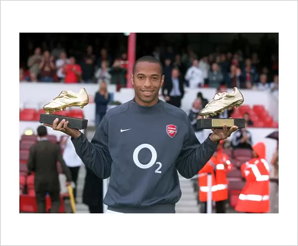 Thierry Henry (Arsenal)with his golden boot awards
