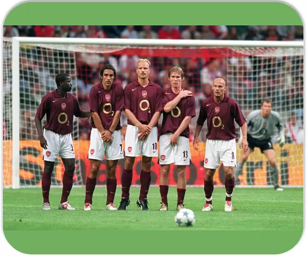 Arsenal Wall (L>R) emmaunel Eboue, Robert Pires, Dennis Bergkamp, Alex Hleb