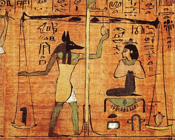 Papyrus from The Book of The Dead, Anubis during the weighing of the souls (psychostasy)