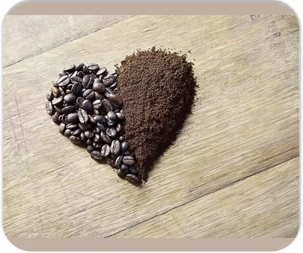 Coffee beans and grounds forming a heart shape