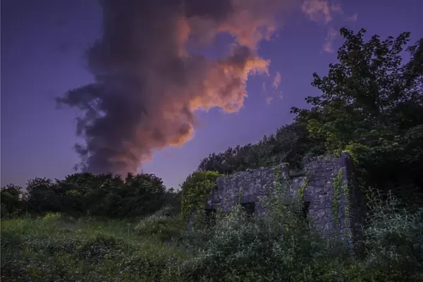 Dusk over ruins in the village of Pembroke, Pembrokeshire, Wales, United Kingdom