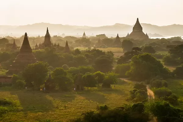 Pagoda in Bagan pagoda field orange sun light