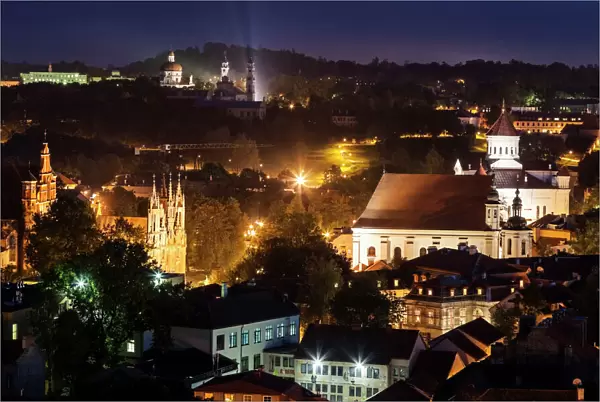 Lithuania, Vilnius, Illuminated cityscape