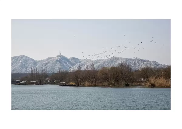 The West Lake against snow-covered hills, Hangzhou, China