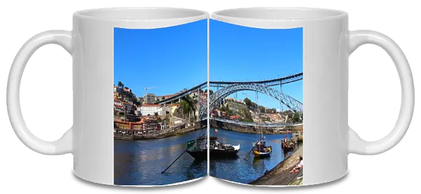 Dom Luis I bridge and rabelo boats in Porto