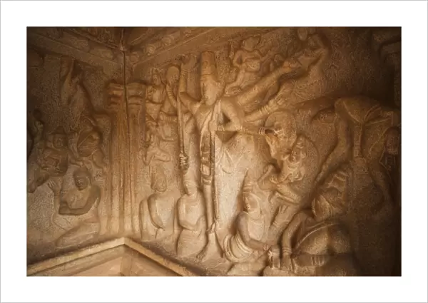 Carving details of Trivikrama the Vamana avatar of Vishnu with one leg on the earth and the other on the skie at Varaha Cave Temple, Mahabalipuram, Kanchipuram District, Tamil Nadu, India