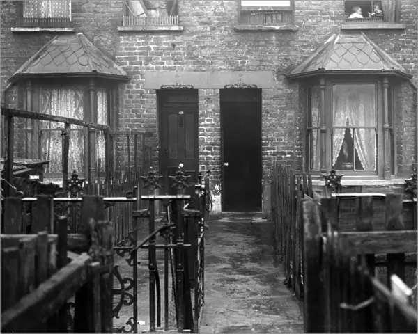 Backyards. December 1923: Slum housing in Crossland Square, Bethnal Green, London