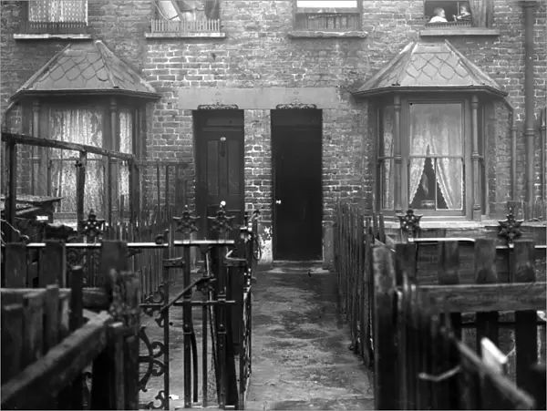Backyards. December 1923: Slum housing in Crossland Square, Bethnal Green, London