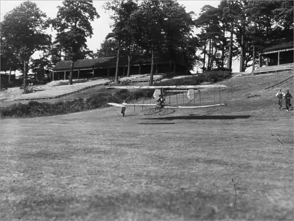Gliding. July 1910: An aeroplane gliding at Brooklands