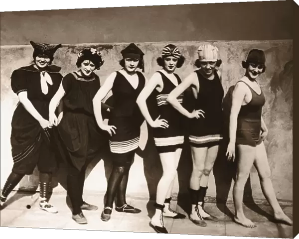 Group of young women wearing bathing suits, portrait (B&W sepia)