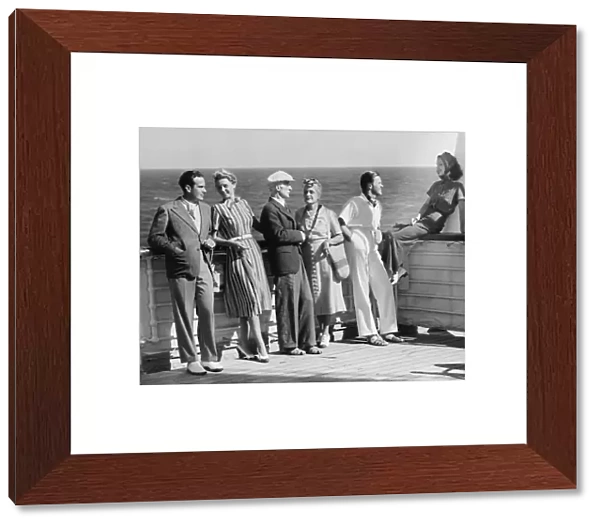 Group of people standing on cruiser deck (B&W)