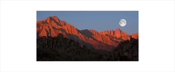 Mount Whitney with full moon at sunrise