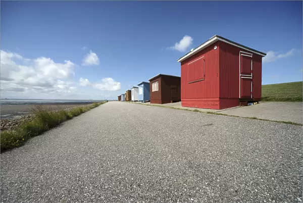 Colorful beach huts on the dike at the North Sea, Dagebuell, North Frisia, Schleswig-Holstein, Germany, Europe