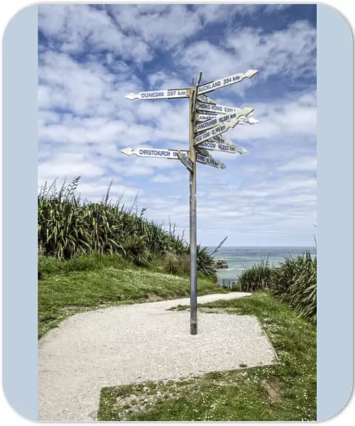 Signpost at Far-Away-Point, Tauranga Bay, Cape Foulwind, South Island, New Zealand, Oceania