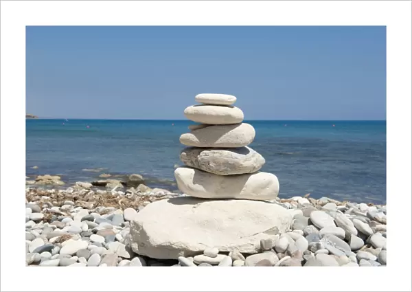 Stacked stones, cairn on the beach, gravel beach, Pissouri Beach, Cape Aspro, eastern Mediterranean sea, Cyprus, Europe