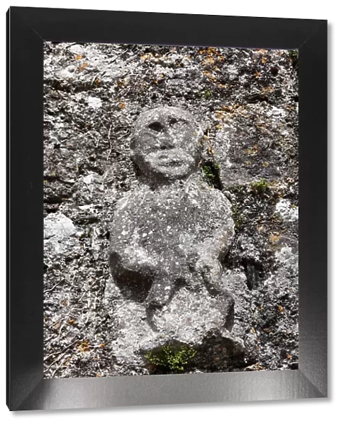 Sheela-na-Gig on the church wall of Killinaboy, Burren, County Clare, Ireland, Europe