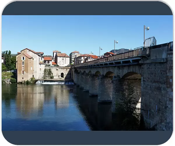 Millau  /  France - old town and historic bridge crossing Tarn River