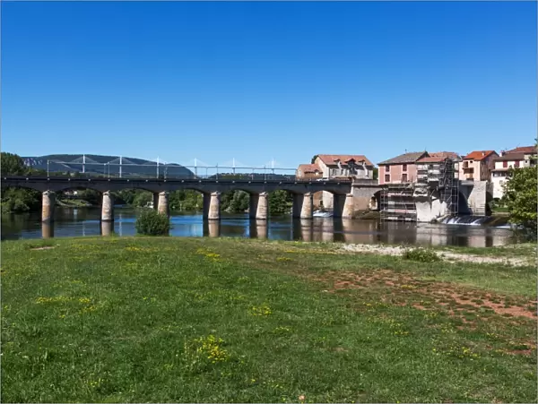 Millau  /  France old town at Tarn River - The Millau Viaduct (for what this city is mostly known) in background