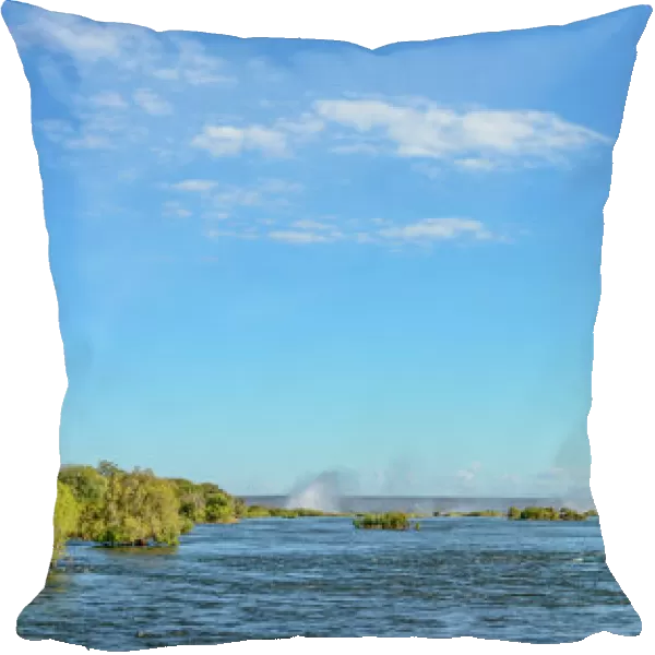 Zambezi River view with the spray from Victoria Falls in the distance. Livingstone. Zambia