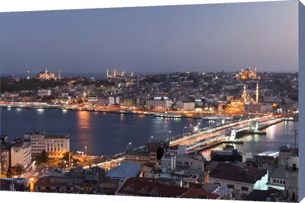 Galata bridge with Old Istanbul at dusk