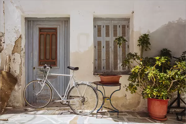 Bike near old house in Naxos town, Naxos, Greece