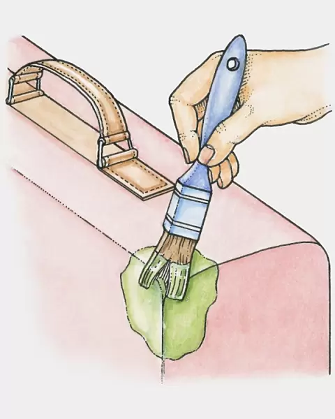 Hand marking luggage with paint